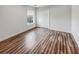 Cozy bedroom with hardwood floors, a closet, and a window offering natural light at 159 Antebellum Way, Summerville, SC 29483