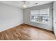 Bedroom with hardwood floors, a ceiling fan, and a window with backyard views at 159 Antebellum Way, Summerville, SC 29483