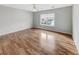 Light bedroom featuring hardwood floors, a ceiling fan, and a window with blinds at 159 Antebellum Way, Summerville, SC 29483