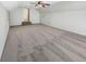 Large bonus room with neutral carpet and access to attic storage at 159 Antebellum Way, Summerville, SC 29483