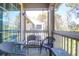 Cozy balcony furnished with wicker chairs and tables, offering an outdoor view of the community at 1600 Long Grove Dr # 626, Mount Pleasant, SC 29464
