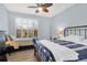 Inviting bedroom with a ceiling fan, bright windows, and comfortable beds at 1600 Long Grove Dr # 626, Mount Pleasant, SC 29464
