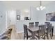 Charming dining room with modern table and chairs at 1600 Long Grove Dr # 626, Mount Pleasant, SC 29464