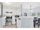 Efficient kitchen featuring white cabinets and a stainless steel microwave, stove, and oven at 1600 Long Grove Dr # 626, Mount Pleasant, SC 29464