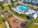 Aerial view of the neighborhood's pool, playground, lounge furniture, and covered trellis seating at 173 Paddle Boat Way, Summerville, SC 29485