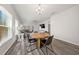 Bright dining area with modern chandelier, neutral walls, modern decor, and sleek flooring at 173 Paddle Boat Way, Summerville, SC 29485