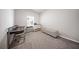 Carpeted room featuring an office desk, chair, and cabinet at 173 Paddle Boat Way, Summerville, SC 29485
