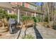 Outdoor patio features stone pavers, sitting bench, gas grill, and screened porch at 1807 Chauncy'S Ct, Mount Pleasant, SC 29466