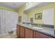 Bathroom features a double vanity, granite countertops, and a shower with stylish curtain at 1807 Chauncy'S Ct, Mount Pleasant, SC 29466