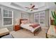 Inviting bedroom with a tray ceiling, natural light, and a cozy aesthetic with calming decor at 1807 Chauncy'S Ct, Mount Pleasant, SC 29466