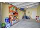 Well-organized garage featuring shelving, a freezer, a bicycle, and ample storage space at 1807 Chauncy'S Ct, Mount Pleasant, SC 29466