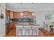 Modern kitchen with stainless steel appliances, granite countertops, and a breakfast bar for casual dining at 1807 Chauncy'S Ct, Mount Pleasant, SC 29466