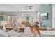 Inviting living room with hardwood floors, neutral paint, lots of light, and comfortable seating at 1807 Chauncy'S Ct, Mount Pleasant, SC 29466