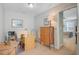 Cozy office space with a desk, neutral colors, and a view into a bedroom at 1807 Chauncy'S Ct, Mount Pleasant, SC 29466