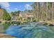 Lovely home overlooking a pond featuring a water fountain and mature trees at 1807 Chauncy'S Ct, Mount Pleasant, SC 29466