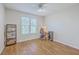 Bedroom featuring a window, ceiling fan and wood-look flooring at 1822 Chatelain Way, Mount Pleasant, SC 29464