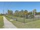 Community dog park surrounded by a black fence providing a fun, secure space for pets to play at 1822 Chatelain Way, Mount Pleasant, SC 29464
