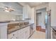 Open kitchen with stainless steel appliances, granite countertops, and adjacent dining area at 1822 Chatelain Way, Mount Pleasant, SC 29464