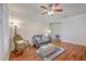 Cozy living room features hardwood floors, neutral walls, and classic furniture at 1822 Chatelain Way, Mount Pleasant, SC 29464