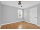Bedroom featuring hardwood floors, one window, and a neutral color scheme at 1873 Hazelwood Dr, Charleston, SC 29407