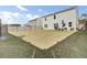 Backyard with a grill, seating area, privacy fence and a large grassy lawn at 203 Hayworth Rd, Summerville, SC 29486