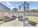 Charming backyard featuring an outdoor seating area, a privacy fence and lush green space at 203 Hayworth Rd, Summerville, SC 29486