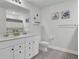Stylish bathroom with double sinks, decorative tile floor and attractive decor at 203 Hayworth Rd, Summerville, SC 29486
