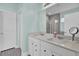 This bathroom features double sinks, large mirror, and a step in shower at 203 Hayworth Rd, Summerville, SC 29486