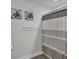 Bathroom with a shower-tub combo, decorative fish decor and stylish tile at 203 Hayworth Rd, Summerville, SC 29486