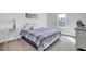 Comfortable bedroom with a queen bed, soft carpet, natural light and calming decor at 203 Hayworth Rd, Summerville, SC 29486