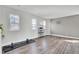 The bonus room features wood floors and plenty of natural lighting at 203 Hayworth Rd, Summerville, SC 29486