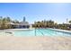 Community pool with clear blue water, area, and covered seating at 203 Hayworth Rd, Summerville, SC 29486