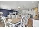 Open concept dining area with hardwood floors and seamless access to the living room and kitchen at 203 Hayworth Rd, Summerville, SC 29486