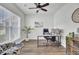 Bright and airy home office with a ceiling fan, a large window and an organized work space at 203 Hayworth Rd, Summerville, SC 29486
