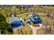 Sprawling property featuring a home with a pool, large garage, and several vehicles parked on the grounds at 212 Chester Ln, Cottageville, SC 29435