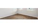 Bright bedroom with white walls and wood flooring at 2196 Macallan Blvd, Ravenel, SC 29470