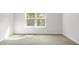 Bedroom with a large window providing natural light at 2196 Macallan Blvd, Ravenel, SC 29470