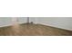Spacious bedroom with sleek wood flooring and neutral color palette at 2275 Macallan Blvd, Ravenel, SC 29470