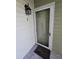 Front door of condo unit with a lantern and unit number on the exterior wall at 2326 Treescape Dr # 2, Charleston, SC 29414