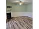 An open living space that includes vinyl flooring, fireplace and neutral paint color at 2326 Treescape Dr # 2, Charleston, SC 29414