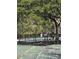 Community pool featuring large pool area, multiple trees and fencing around the perimeter at 2326 Treescape Dr # 2, Charleston, SC 29414