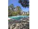 Community pool featuring large pool area, multiple trees and fencing around the perimeter at 2326 Treescape Dr # 2, Charleston, SC 29414