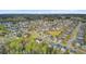 An aerial view showcases a neighborhood with tree-lined streets and well-maintained homes at 236 Emerald Isle Dr, Moncks Corner, SC 29461
