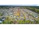 High angle aerial view of houses with lush green trees in the background at 236 Emerald Isle Dr, Moncks Corner, SC 29461