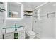 Bathroom featuring a vanity with a glass sink, an LED mirror and a glass door shower at 236 Emerald Isle Dr, Moncks Corner, SC 29461