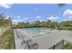 A recreational pool with deck chairs for relaxation and enjoyment on a sunny day at 236 Emerald Isle Dr, Moncks Corner, SC 29461