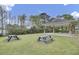Outdoor picnic area with covered pavilion provides space for gatherings by the lake at 236 Emerald Isle Dr, Moncks Corner, SC 29461