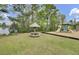 Community playground features a picnic table with gazebo and play structure with slides at 236 Emerald Isle Dr, Moncks Corner, SC 29461