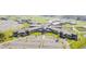 Aerial shot of Cane Bay High School showcasing its extensive layout, parking, and beautifully landscaped grounds at 261 Celestial Blvd, Summerville, SC 29486