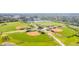 Aerial shot of Cane Bay's well-maintained baseball complex surrounded by lush greenery and community amenities at 261 Celestial Blvd, Summerville, SC 29486